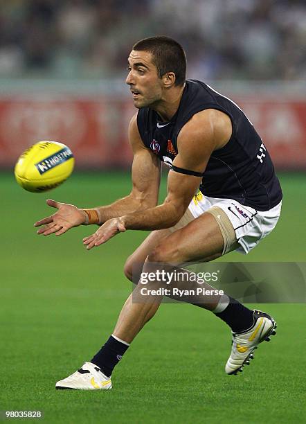 Kade Simpson of the Blues in action during the round one AFL match between the Richmond Tigers and Carlton Blues at the Melbourne Cricket Ground on...