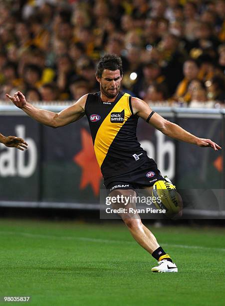 Chris Newman of the Tigers in action during the round one AFL match between the Richmond Tigers and Carlton Blues at the Melbourne Cricket Ground on...