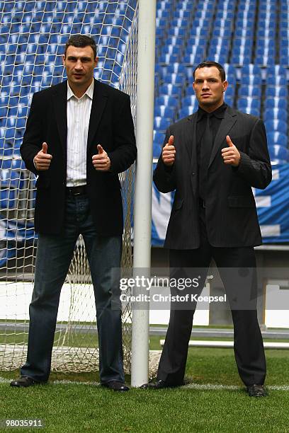 Vitali Klitschko of Ukraine poses with Albert Sosnowski of Poland before the press conference at Veltins Arena on March 25, 2010 in Gelsenkirchen,...