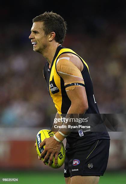 Brett Deledio of the Tigers in action during the round one AFL match between the Richmond Tigers and Carlton Blues at the Melbourne Cricket Ground on...