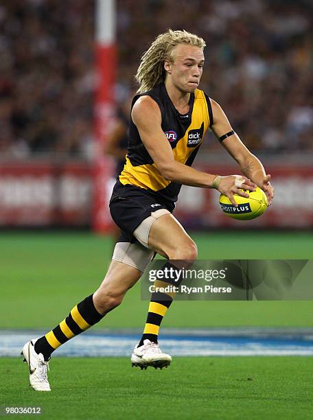 Ben Nason of the Tigers in action during the round one AFL match between the Richmond Tigers and Carlton Blues at the Melbourne Cricket Ground on...