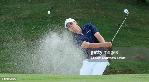 Christiaan Bezuidenhout of South Africa plays out of a bunker on the 2nd hole during day one of the BMW International Open at Golf Club Gut...