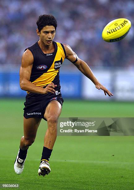 Robin Nahas of the Tigers in action during the round one AFL match between the Richmond Tigers and Carlton Blues at the Melbourne Cricket Ground on...