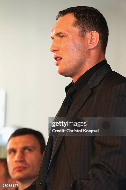 Vitali Klitschko of Ukraine watches his opponent Albert Sosnowski of Poland durng the press conference at Veltins Arena on March 25, 2010 in...