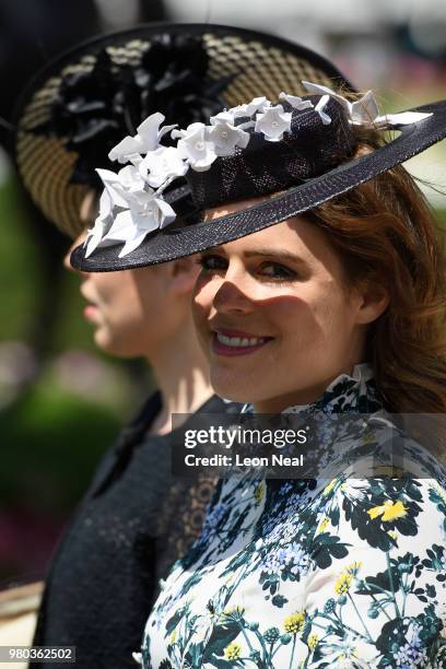 Britain's Princess Beatrice and Princess Eugenie take part in the Royal Parade during Royal Ascot Day 3 at Ascot Racecourse on June 21, 2018 in...