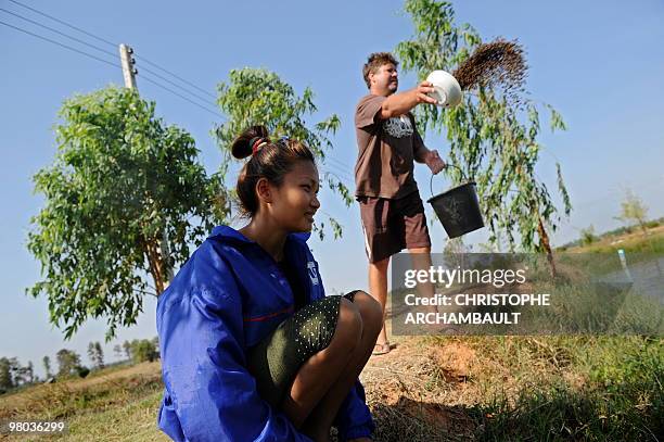 Thailand-society-marriage-Western-lifestyle,FEATURE by Rachel O'BRIEN This picture taken on January 12, 2010 shows Australian man Ronnie Behnke...