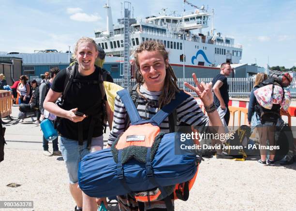 Festival goers attending the Isle of Wight Festival 2018, arrive in Cowes, Isle of Wight.