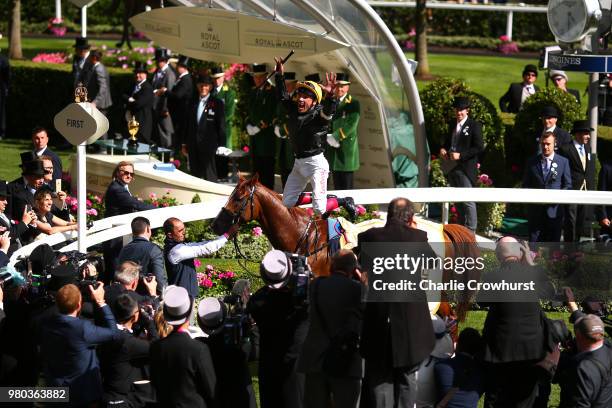 Frankie Dettori celebrates as he ride Stradivarius to win The Gold Cup on day 3 of Royal Ascot at Ascot Racecourse on June 21, 2018 in Ascot, England.