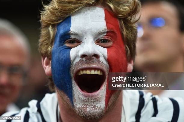 French fan reacts during the Russia 2018 World Cup Group C football match between France and Peru at the Ekaterinburg Arena in Ekaterinburg on June...