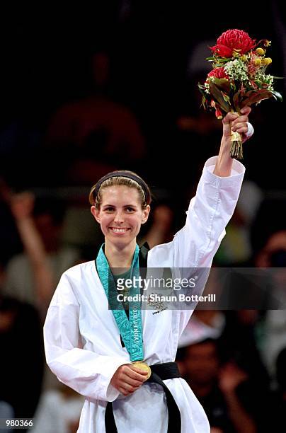 Lauren Burns of Australia celebrates after defeating Urbia Melendez Rodriguez of Cuba for the gold medal in the Women's 49kg Taekwondo Final held at...