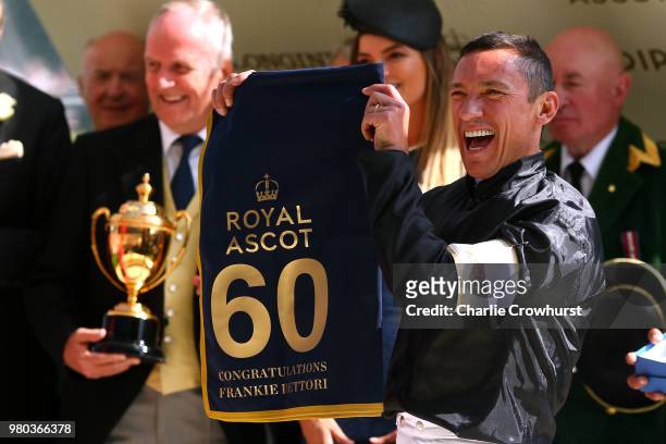 Frankie Dettori with his award for riding his 60th winner at Ascot on day 3 of Royal Ascot at Ascot Racecourse on June 21, 2018 in Ascot, England.