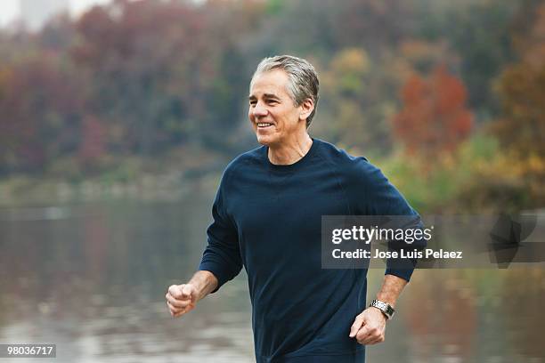 older man jogging - active seniors running stock pictures, royalty-free photos & images