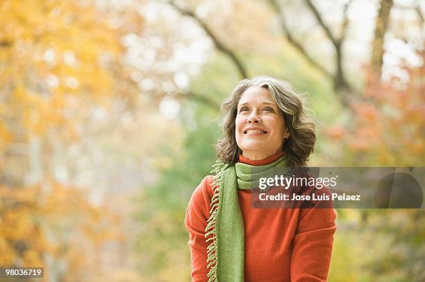 portrait of smiling older woman - scarf stock pictures, royalty-free photos & images