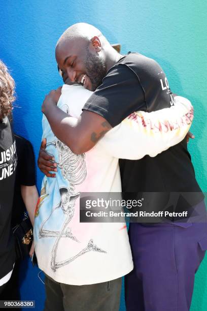 Kanye West and Stylist Virgil Abloh pose after the Louis Vuitton Menswear Spring/Summer 2019 show as part of Paris Fashion Week on June 21, 2018 in...