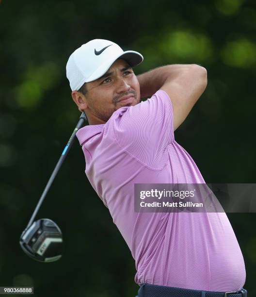 Jason Day of Australia watches his tee shot on the 13th hole during the first round of the Travelers Championship at TPC River Highlands on June 21,...