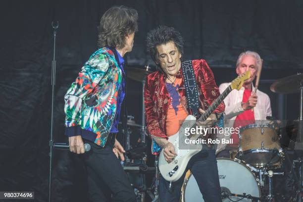 Mick Jagger, Ronnie Wood and Charlie Watts from The Rolling Stones perform live on stage at Twickenham Stadium on June 19, 2018 in London, England.