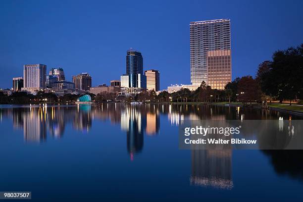 skyline from lake eola, dawn - lake eola stock pictures, royalty-free photos & images