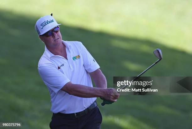 Charley Hoffman hits his third shot on the 18th hole during the first round of the Travelers Championship at TPC River Highlands on June 21, 2018 in...