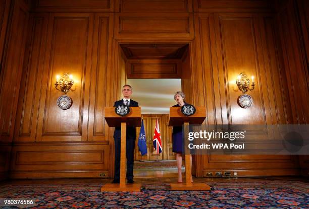 British Prime Minister Theresa May and Secretary General of NATO Jens Stoltenberg hold a press conference inside Number 10 Downing Street on June 21,...