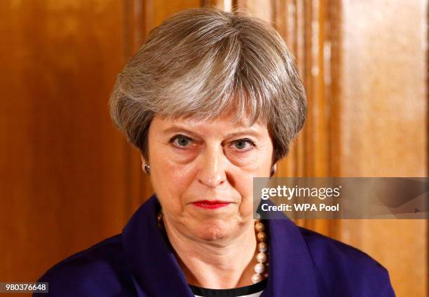 British Prime Minister Theresa May is seen during a press conference with Secretary General of NATO Jens Stoltenberg inside Number 10 Downing Street...