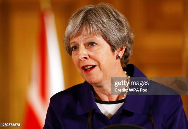British Prime Minister Theresa May speaks during a press conference with Secretary General of NATO Jens Stoltenberg inside Number 10 Downing Street...