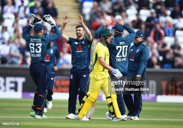 Mark Wood celebrates as he Aaron Finch of Australia out during the 4th Royal London ODI match between England and Australia at Emirates Durham ICG on...