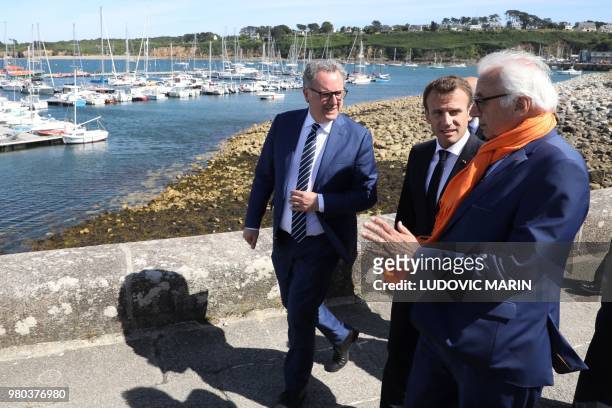 French President Emmanuel Macron and President of the La Republique en Marche parliamentary group, Richard Ferrand speak with SNSM President Xavier...
