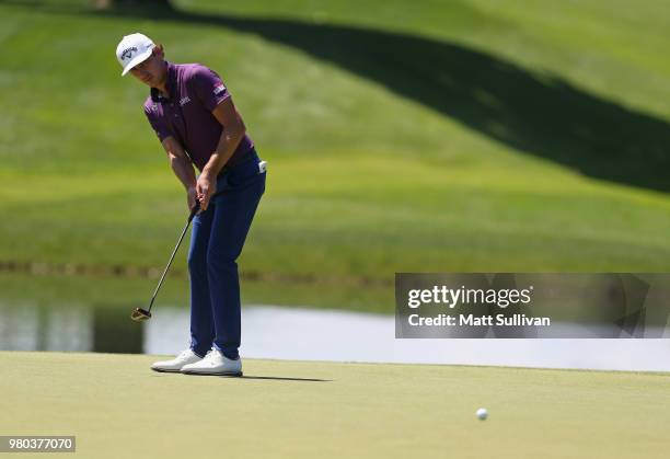 Kelly Kraft misses a birdie putt on the eighth hole during the first round of the Travelers Championship at TPC River Highlands on June 21, 2018 in...