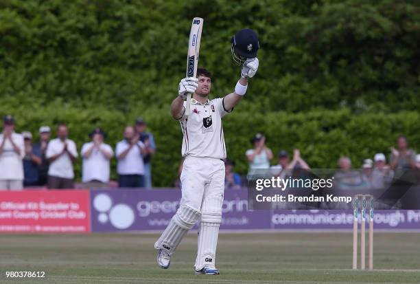 Sean Dickson of Kent celebrates reaching his century on day two of the Specsavers County Championship: Division Two match between Kent and...