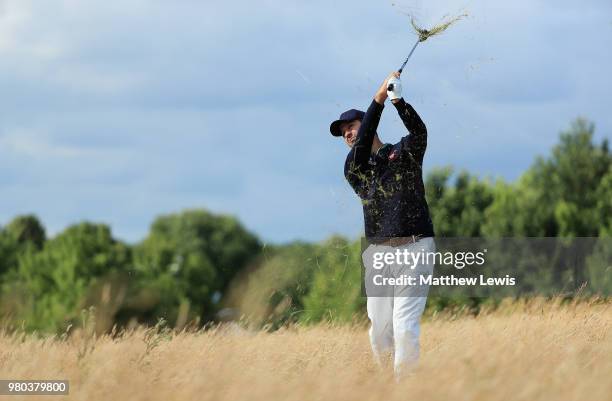 Jorge Campillo of Spain plays out of the rough on the 9th hole during day one of the BMW International Open at Golf Club Gut Larchenhof on June 21,...