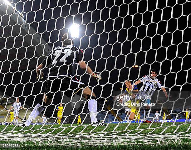 Samir Handanovic goal kepeer of Udinese and Mauricio Anibal Isla of Udinese and Giampiero Pinzi of Chievo in action during the Serie A match between...