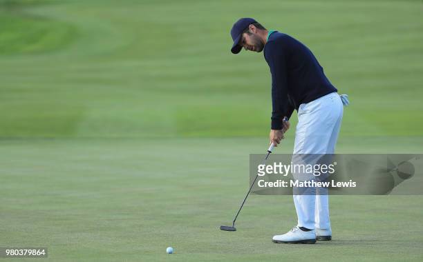 Jorge Campillo of Spain makes a putt on the 8th green during day one of the BMW International Open at Golf Club Gut Larchenhof on June 21, 2018 in...