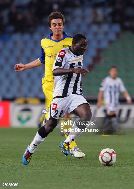 Cristian Zapata of Udinese competes with Simone Bentivoglio of Chievo during the Serie A match between Udinese Calcio and AC Chievo Verona at Stadio...