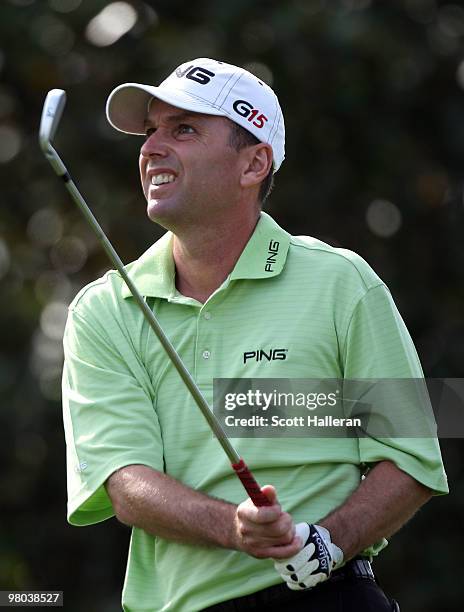 Kevin Sutherland watches a shot on the second tee during the first round of the Arnold Palmer Invitational presented by MasterCard at the Bayhill...