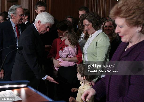 Sen. Christopher Dodd , Sen. Tom Harkin , and Sen. Debbie Stabenow greets guests during a news conference on health reform on Capitol Hill on March...