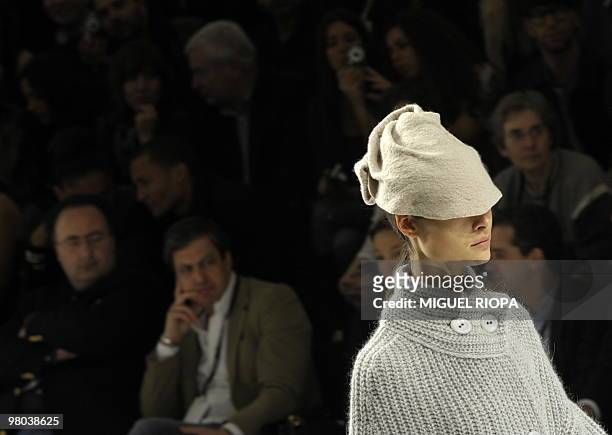 Model presents a creation by Portuguese fashion designer Luis Buchinho, on the second day of Portugal Fashion, in Porto, on March 20, 2010. AFP...