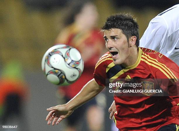 Spanish David Villa eyes the ball during the FIFA Confederations Cup football match New Zealand vs Spain on June 14, 2009 at the Royal Bakofeng...