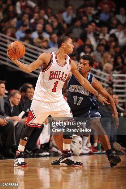 Ronnie Price of the Utah Jazz defends against Derrick Rose of the Chicago Bulls during the game on March 9, 2010 at the United Center in Chicago,...