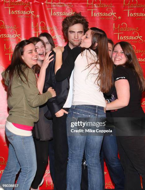 Fans attends the Robert Pattinson wax figure unveiling at Madame Tussauds on March 25, 2010 in New York City.