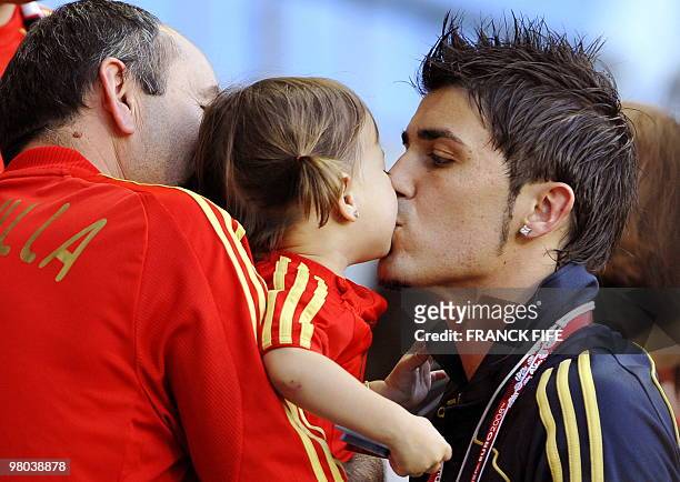 Injured Spanish forward David Villa kisses his daughter Zaida before the start of the Euro 2008 championships final football match Germany vs. Spain...
