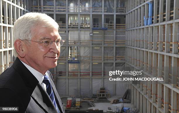 Ernst Uhrlau, head of the German intelligence service, the BND, poses for photographers as he attended a topping-out ceremony for the new German...