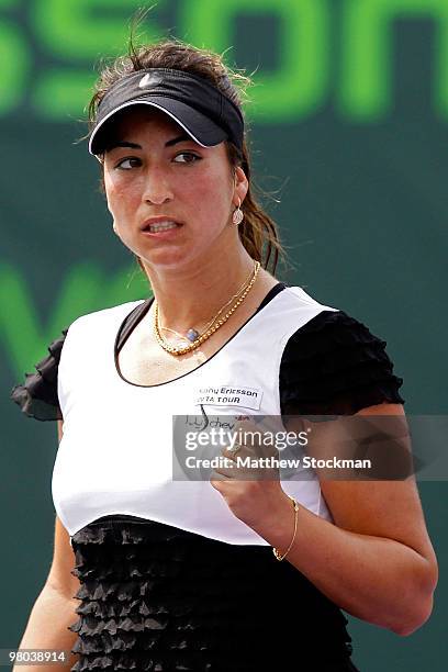 Aravane Rezai of France reacts after a shot against Petra Martic of Croatia during day three of the 2010 Sony Ericsson Open at Crandon Park Tennis...