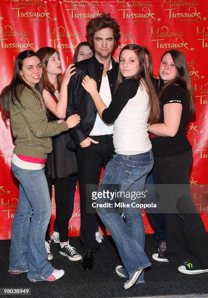 Fans attends the Robert Pattinson wax figure unveiling at Madame Tussauds on March 25, 2010 in New York City.