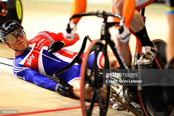 Sir Chris Hoy of Great Britain crashes at the start of the Men's Keirin on Day Two of the UCI Track Cycling World Championships at the Ballerup Super...