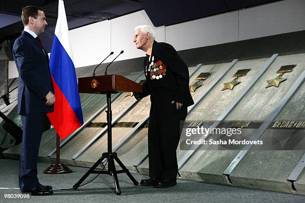 Russian President Dmitry Medvedev meets a veteran of World War II during a visit to a war memorial on March 25, 2010 in Volgograd , Russia. Medvedev...