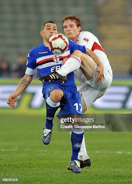 Angelo Palombo of Sampdoria and Alessandro Gazzi of Bari in action during the Serie A match between AS Bari and UC Sampdoria at Stadio San Nicola on...