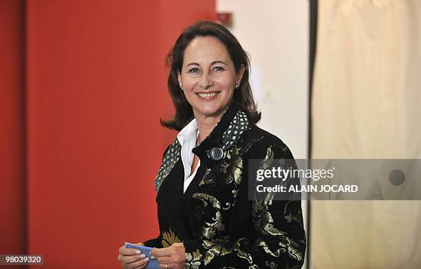 French socialist outgoing president of the regional council of Poitou-Charentes and candidate to her own succession, Segolene Royal, leaves a polling...