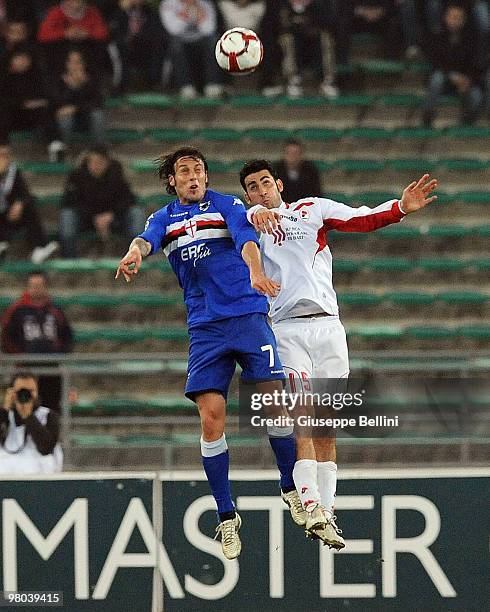 Daniele Mannini of Sampdoria and Nicola Belmonte of Bari in action during the Serie A match between AS Bari and UC Sampdoria at Stadio San Nicola on...