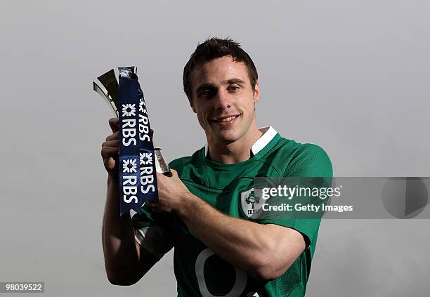 Tommy Bowe, of Ireland is presented with the RBS 6 Nations 2010 Player of the Championship award at the Llandarcy Academy of Sport on March 25, 2010...