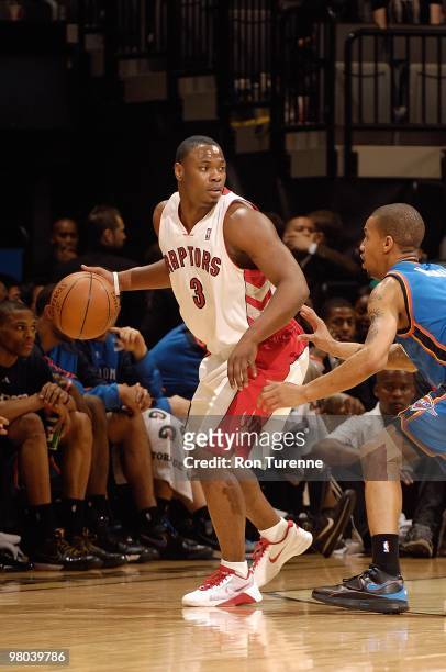 Marcus Banks of the Toronto Raptors handles the ball against Eric Maynor of the Oklahoma City Thunder during the game on March 19, 2010 at Air Canada...